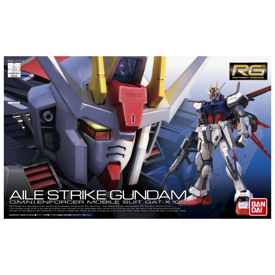 RG Aile Strike Gundam Gundam SEED box art, depicting the mobile suit in action with Beam Rifle, Shield, and Aile Striker pack in an intense pose.