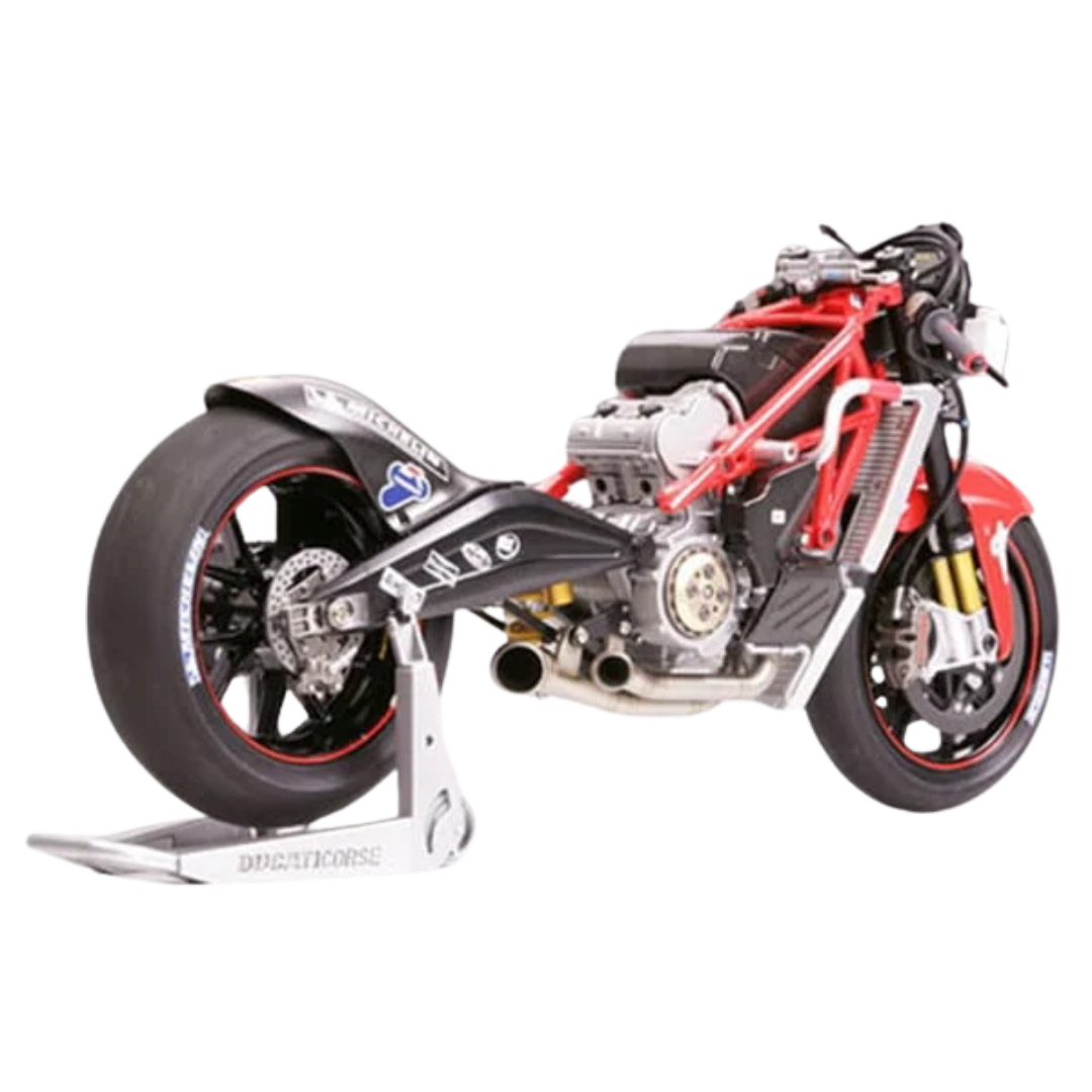 Tamiya 1/12 Motorcycle Model – Ducati Desmosedici – This highly detailed scale model kit includes all the parts needed to assemble a 1/12 replica of the Ducati Desmosedici. The kit features precision-molded plastic parts, realistic decals, rubber tires, and a detailed engine assembly. Perfect for model enthusiasts and fans of Ducati motorcycles looking to create a stunning display piece. Motorcycle building kit, motor details, bike kit, building kit