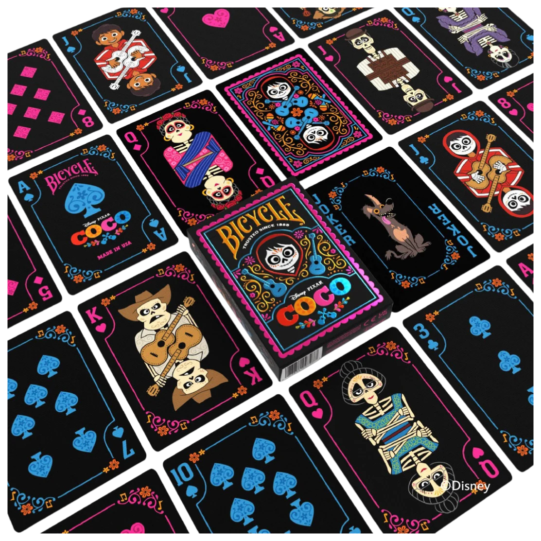 Bicycle Coco playing cards with colorful designs on a black background