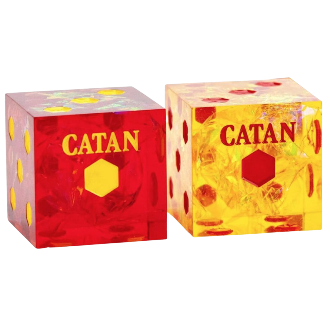 CATAN sharp-edge D6 dice set with translucent red resin and yellow sparkle inclusions.