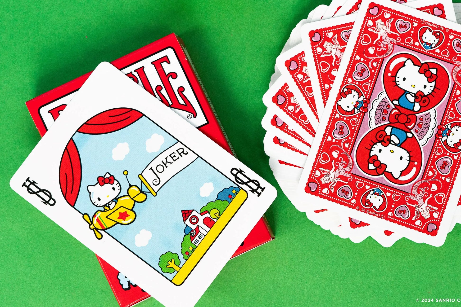 Bicycle Playing Cards - Hello Kitty 50th Anniversary Edition, featuring adorable Hello Kitty artwork and a commemorative tuck box.