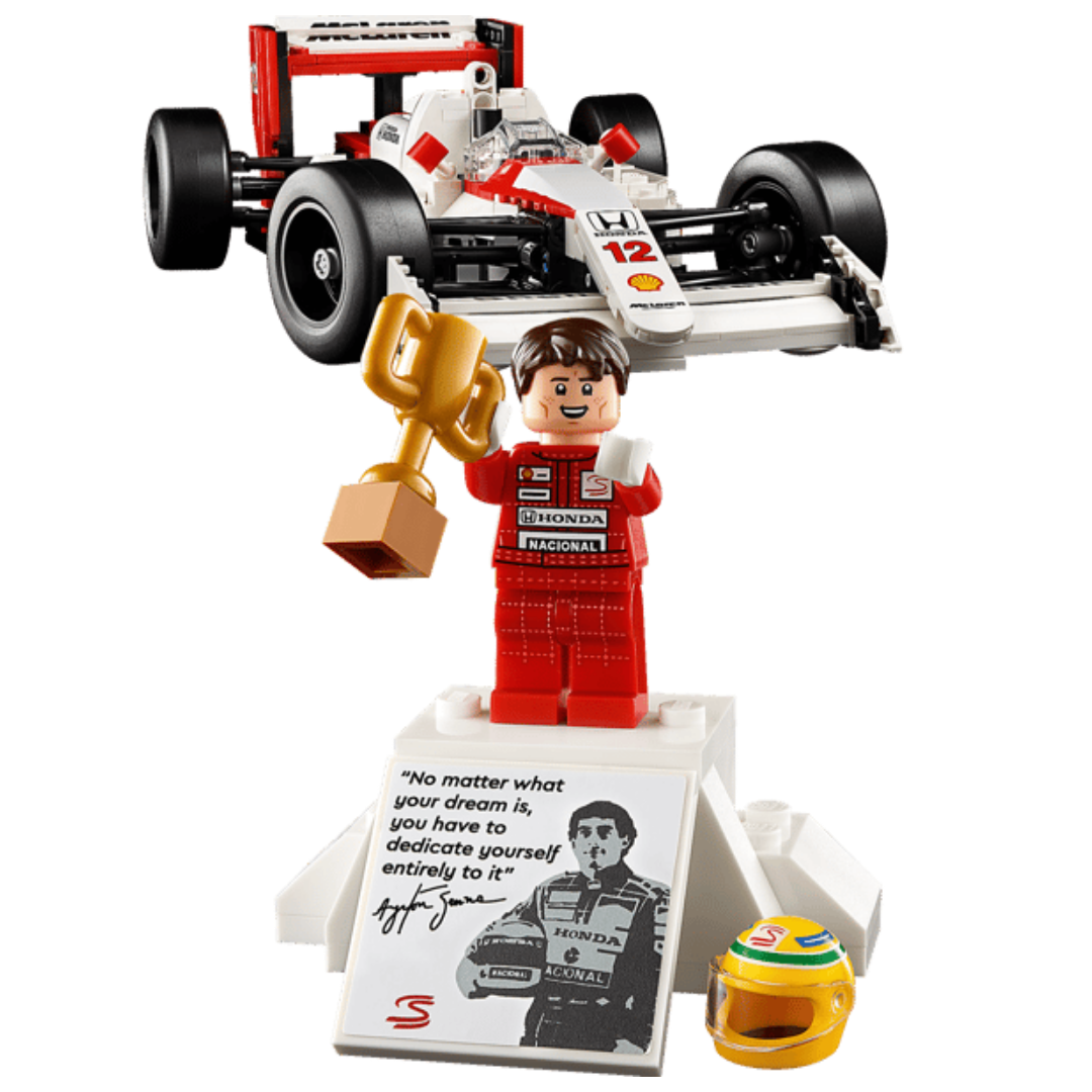 Lego McLaren MP4/4 and Ayrton Senna 10330 Ayrton Senna minifigure with trophy, helmet, and commemorative display plaque
