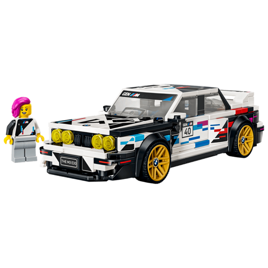 Lego BMW M3 E30 77263 front view with motorsport graphics, gold wheels, yellow lights, and driver minifigure