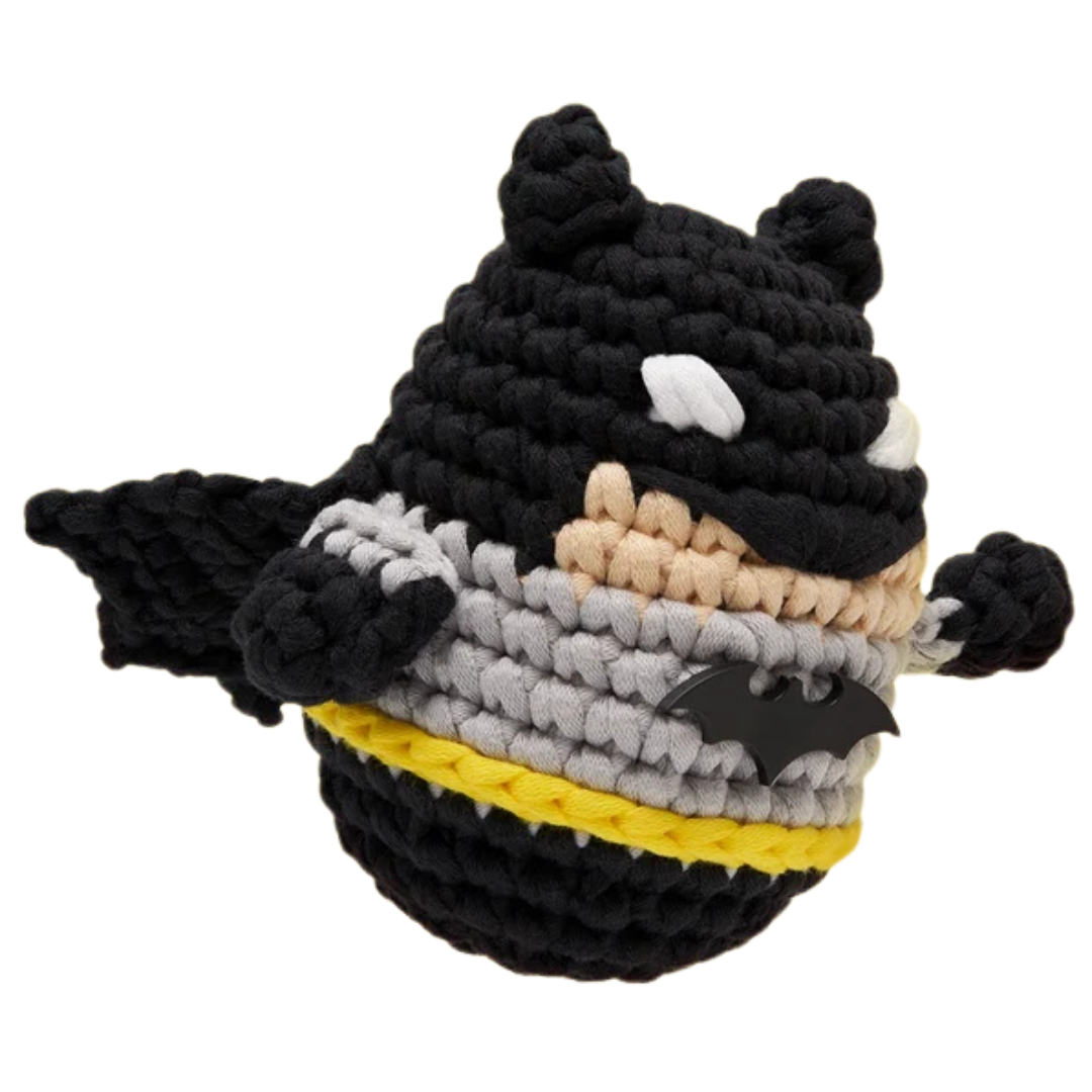 The Woobles DC Batman crochet figure with black cape, gray suit, bat symbol, and yellow utility belt