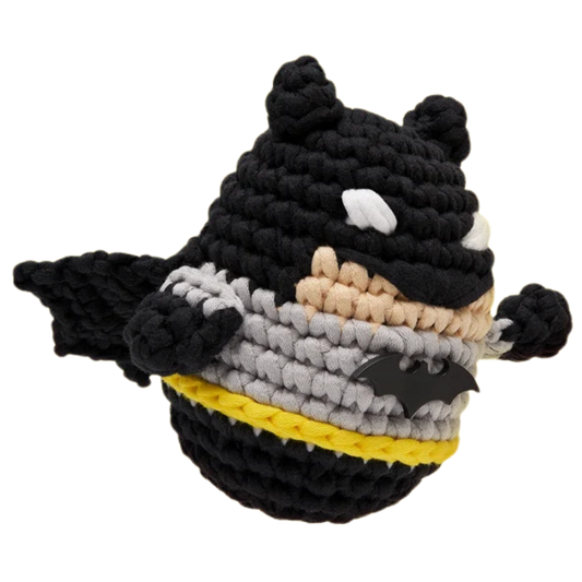 The Woobles DC Batman crochet figure with black cape, gray suit, bat symbol, and yellow utility belt