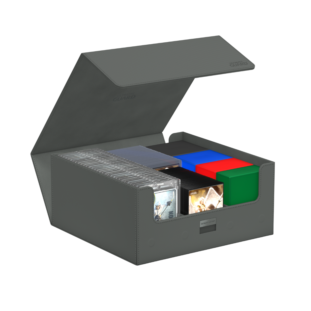 Ultimate Guard Treasure Hive 90+ Grey partially open, filled with deck boxes and trading cards, showcasing its spacious storage capacity.
