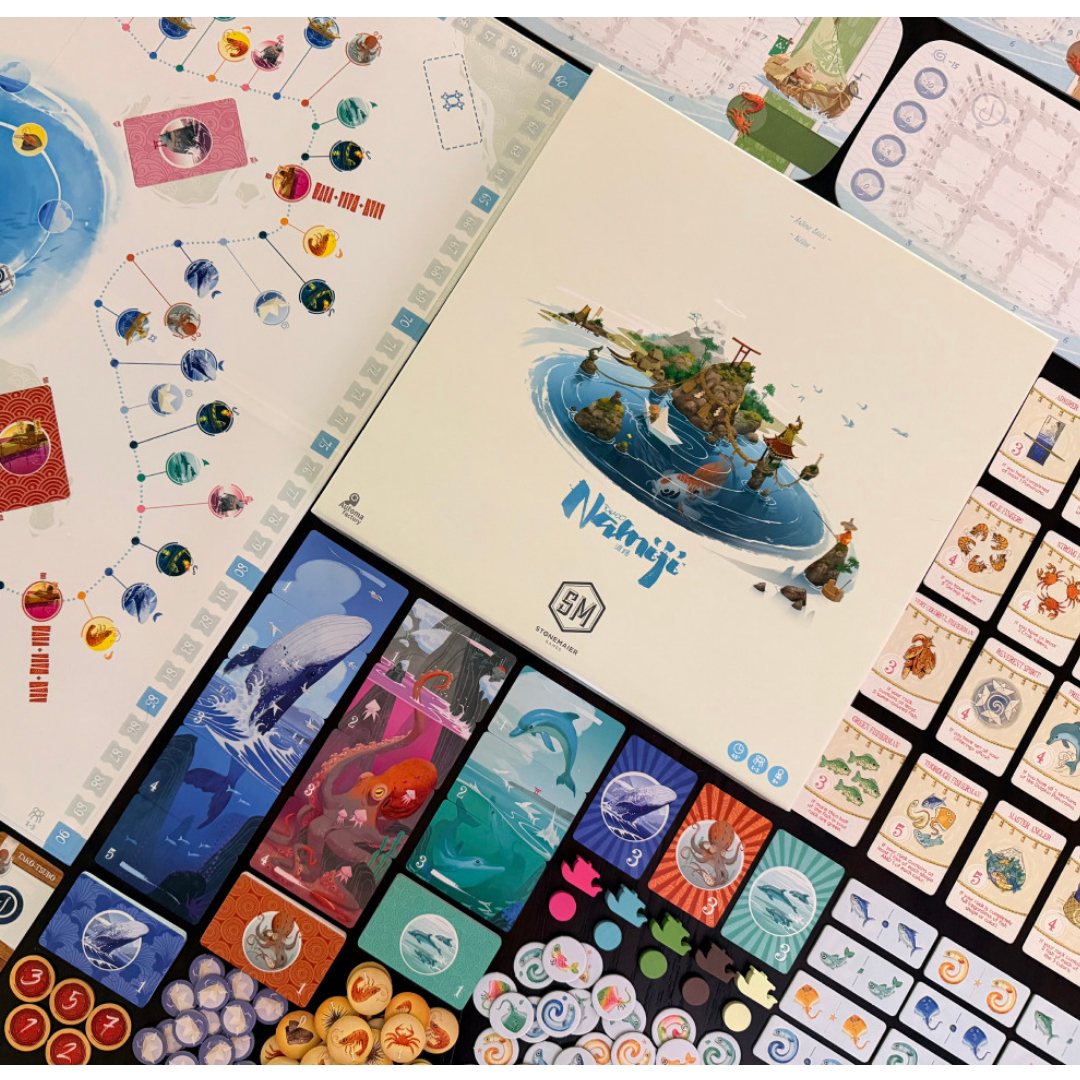 Namiji box beside the game board, colourful marine panorama cards, and tokens